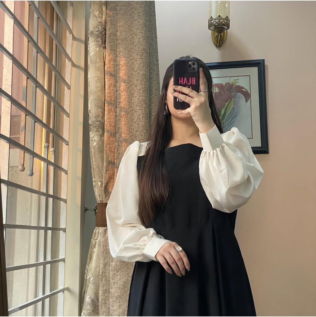 Monochrome Grace – Black & White Pleated Dress