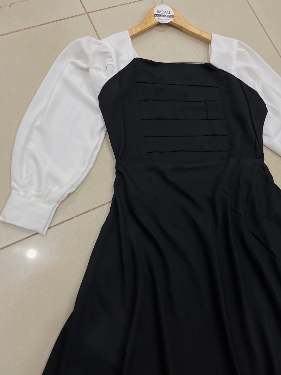 Monochrome Grace – Black & White Pleated Dress